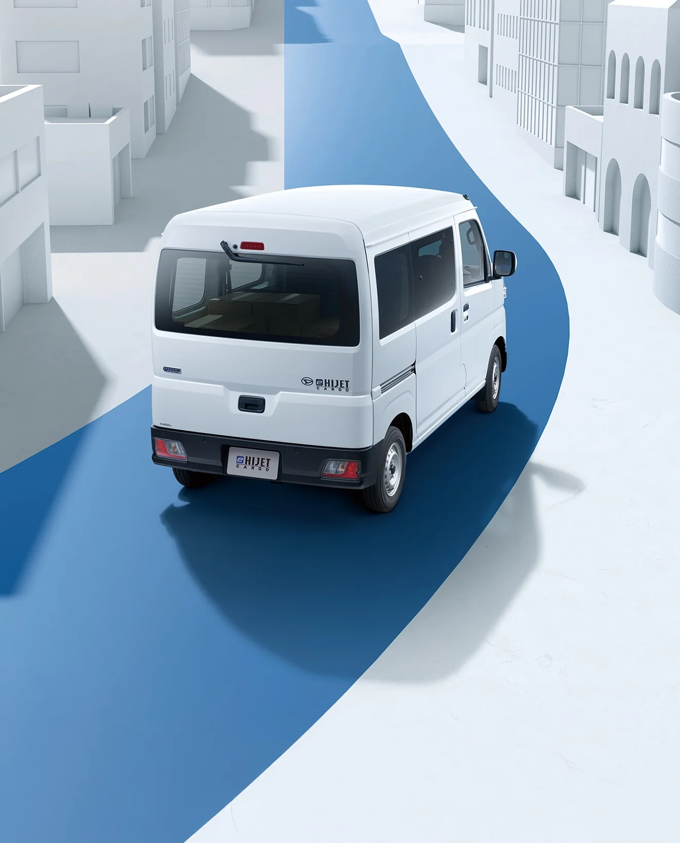 画像：走行距離の長い道路を走行しているe-ハイゼット カーゴ