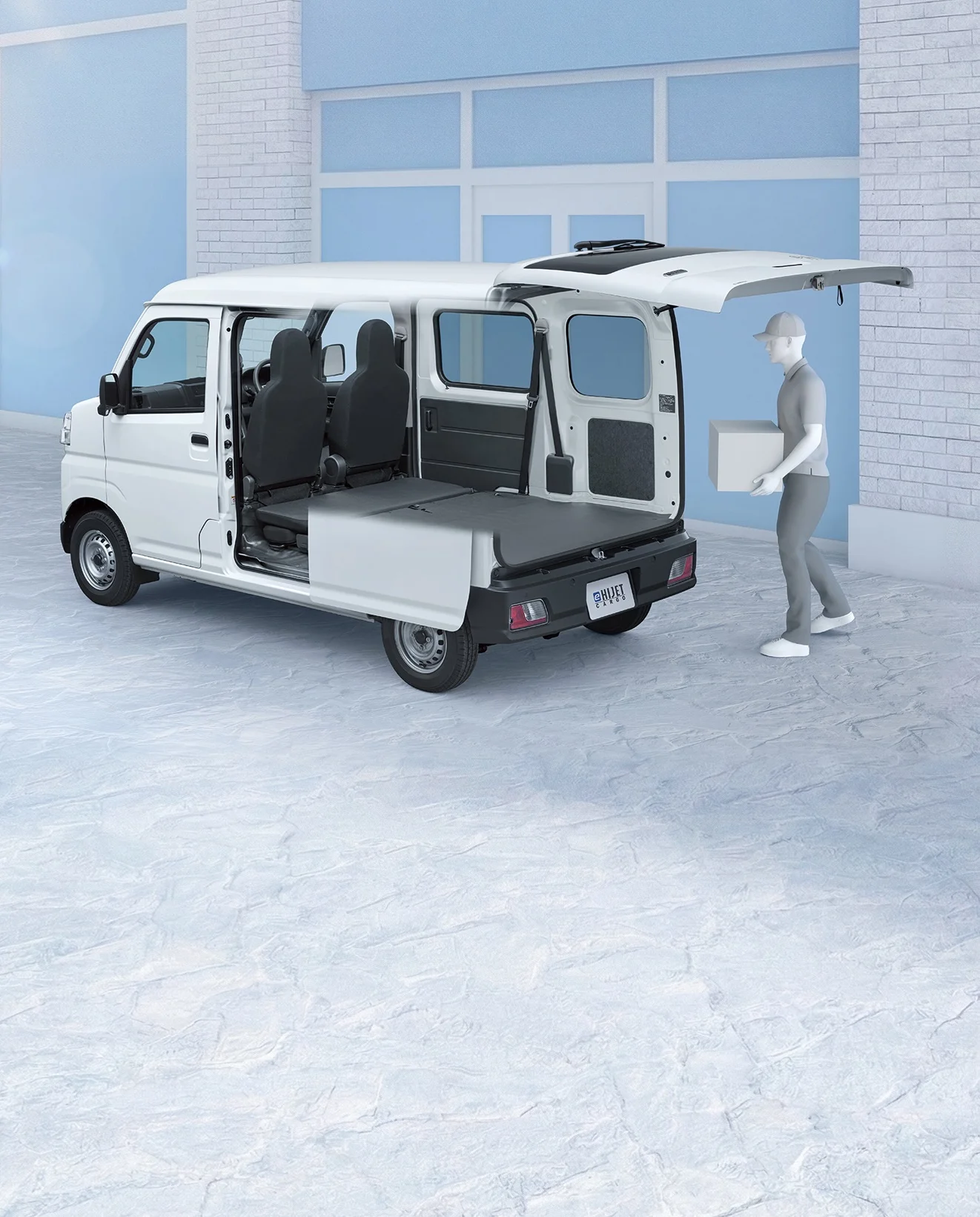 画像：配達員がe-ハイゼット カーゴに荷物を積んでいる様子